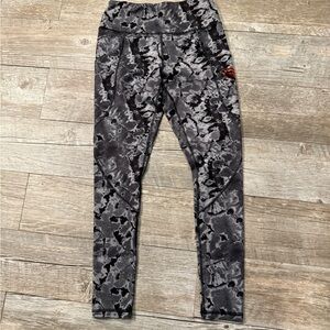 Oregon State University Tie Dye pocketed black and grey leggings.